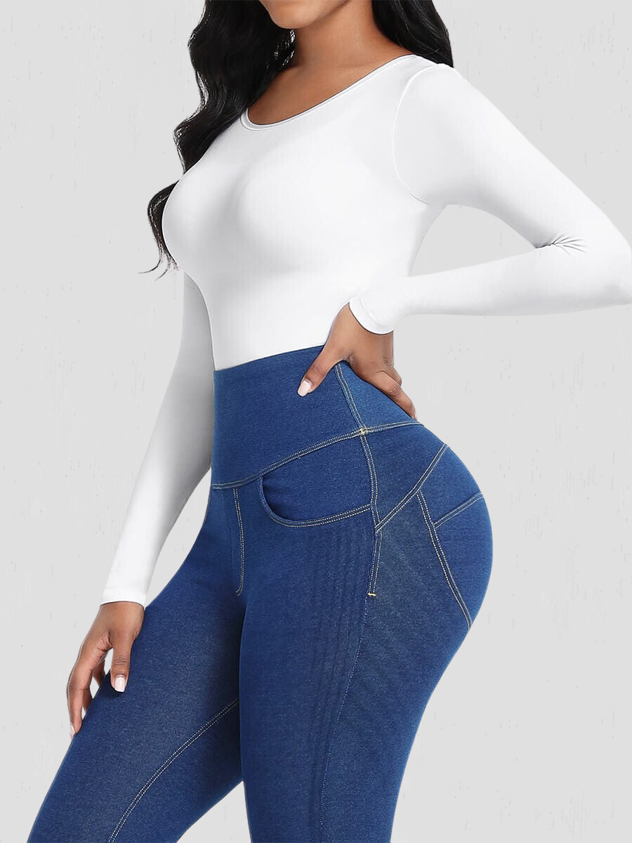 Woman wearing a white long-sleeve shaping bodysuit by BodyFlexx Shapewear with blue jeans.