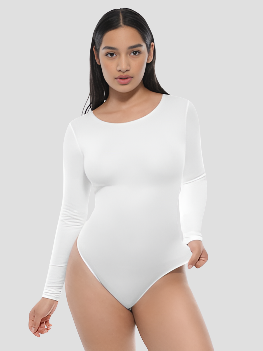 Woman wearing a white long-sleeve shapewear bodysuit against a plain background by BodyFlexx