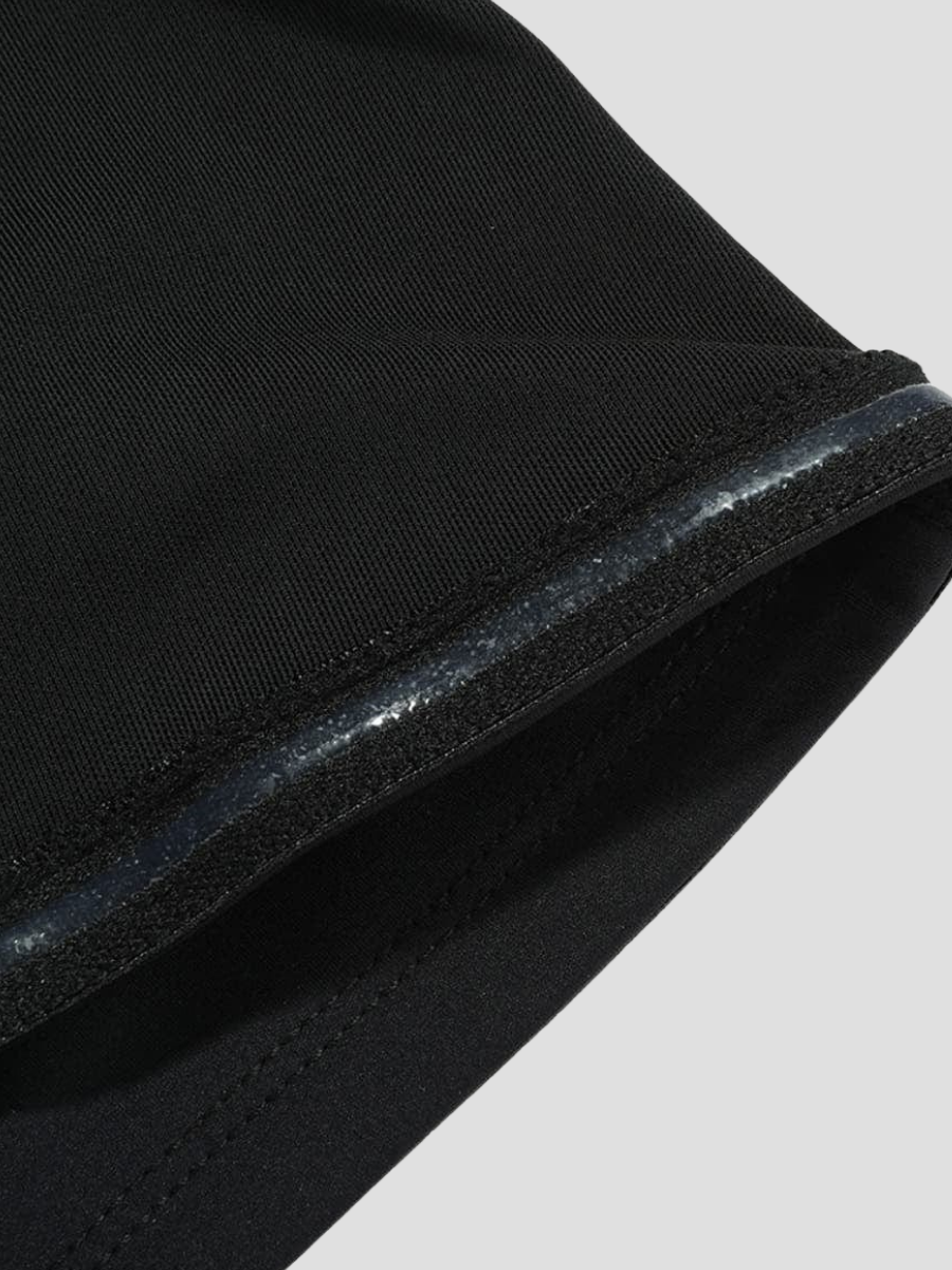 Close-up of the no-slip silicone  waist band on a pair of BodyFlexx waist trainer leggings.