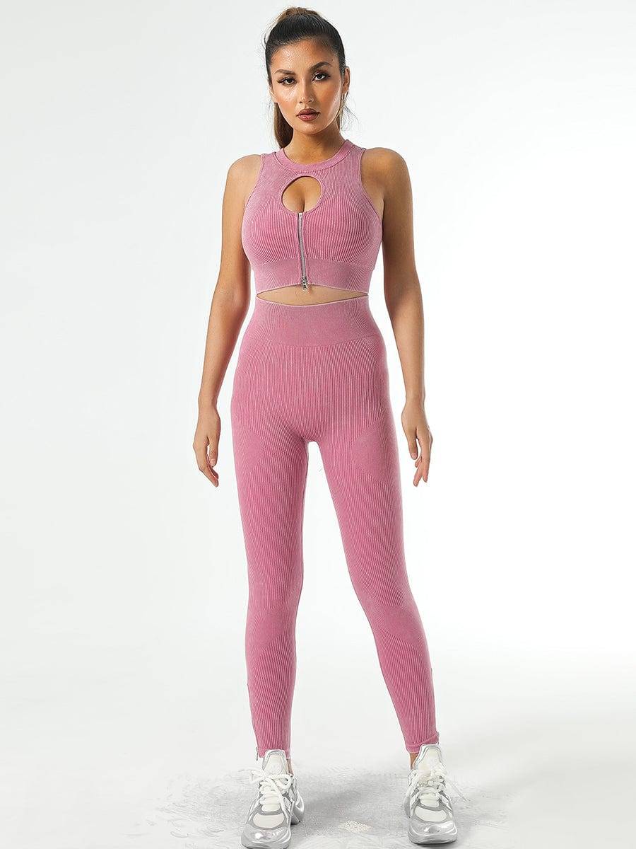 Woman wearing high-waisted ribbed pink leggings with a matching sports bra designed by BodyFlexx.